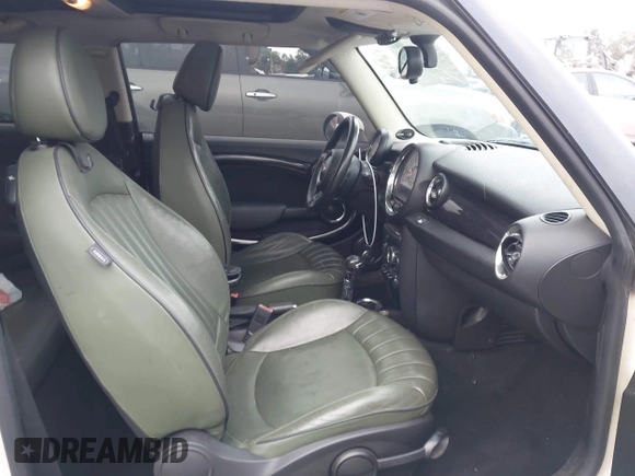2011 MINI Hardtop with VIN WMWSU3C56BT093403, listed as a IAAI auction lot 42795188 with 123,454 mi miles and . Bid and sale history available at DreamBid. Image 5.