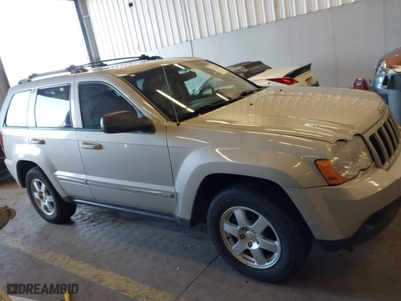 2010 Jeep Grand Cherokee Laredo with VIN 1J4RR4GT9AC106381, listed as a IAAI auction lot 41723268 with 180,008 mi miles. Bid and sale history available at carsss.com. Image 13.