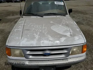 1996 Ford Ranger XLT z VIN 1FTCR10X1TUC90736, wystawiony jako Copart lot #56605575 z przebiegiem 94 262 mil mil oraz Tytuł czysty. Historia ofert i sprzedaży dostępna na DreamBid. Obrazek 12.