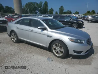 2015 Ford Taurus SEL with VIN 1FAHP2E80FG121013, listed as a Copart auction lot 59940235 with 209,632 mi miles and Clean title. Bid and sale history available at DreamBid. Image 4.