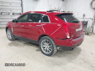 2014 Cadillac SRX Performance Collection z VIN 3GYFNCE30ES596415, wystawiony jako IAAI lot #42329771 z przebiegiem 71 620 mil mil oraz . Historia ofert i sprzedaży dostępna na DreamBid. Obrazek 3.