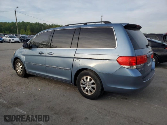 2009 Honda Odyssey EX-L with VIN 5FNRL38759B004710, listed as a Copart auction lot 54210425 with 171,674 mi miles and Salvage Title. Bid and sale history available at DreamBid. Image 2.