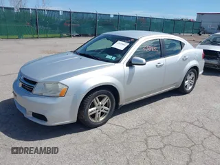 2012 Dodge Avenger SXT with VIN 1C3CDZCB4CN272422, listed as a IAAI auction lot 42122832 with 160,331 mi miles and . Bid and sale history available at carsss.com. Image 2.