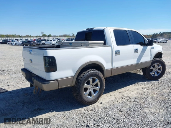 2005 Ford F-150 XLT with VIN 1FTPW12525KF04265, listed as a IAAI auction lot 41863650 with 215,895 mi miles. Bid and sale history available at carsss.com. Image 4.