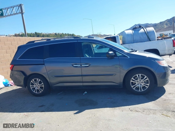 2011 Honda Odyssey EX-L with VIN 5FNRL5H68BB092628, listed as a IAAI auction lot 41820351 with 243,538 mi miles. Bid and sale history available at carsss.com. Image 13.