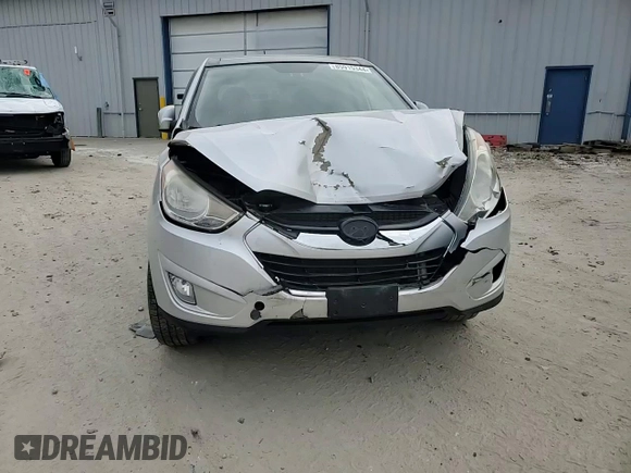 2010 Hyundai Tucson GLS with VIN KM8JU3AC7AU102873, listed as a Copart auction lot 54472385 with 108,853 mi miles and Non Repairable. Bid and sale history available at DreamBid. Image 11.