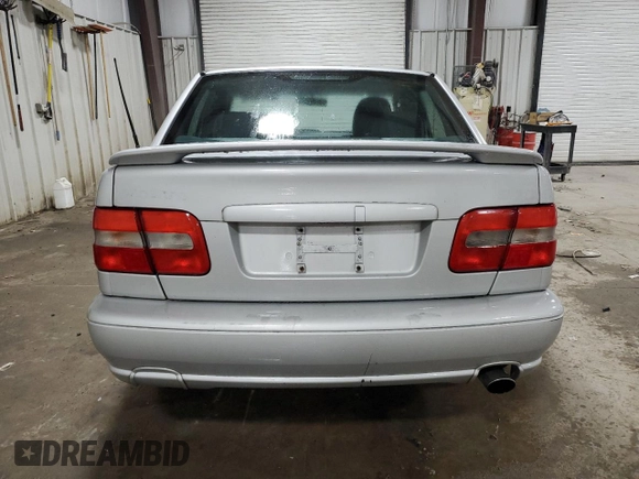 1999 Volvo S70 z VIN YV1LT56D8X2580778, wystawiony jako Copart lot #69043594 z przebiegiem 166 718 mil mil oraz Szkoda całkowita • Salvage title. Historia ofert i sprzedaży dostępna na DreamBid. Obrazek 6.