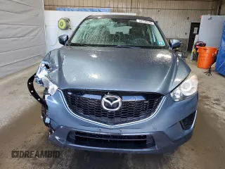 2015 Mazda CX-5 Sport with VIN JM3KE4BY9F0552942, listed as a Copart auction lot 54750245 with 129,700 mi miles and Salvage title. Bid and sale history available at DreamBid. Image 5.