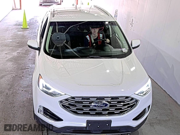 2019 Ford Edge SEL with VIN 2FMPK3J9XKBC37759, listed as a IAAI auction lot 42666643 with 103,812 mi miles and . Bid and sale history available at DreamBid. Image 3.