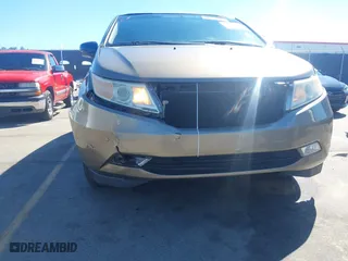 2013 Honda Odyssey Touring with VIN 5FNRL5H96DB066008, listed as a IAAI auction lot 41734055 with 120,292 mi miles. Bid and sale history available at carsss.com. Image 6.