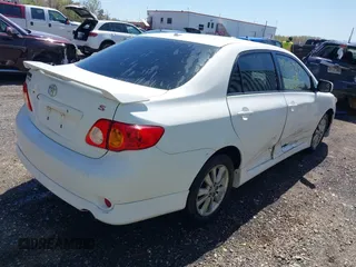 2009 Toyota Corolla with VIN 2T1BU40E49C157663, listed as a IAAI auction lot 42059139 with 135,685 mi miles. Bid and sale history available at carsss.com. Image 4.