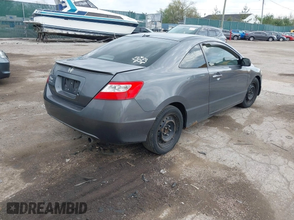 2010 Honda Civic Cpe LX with VIN 2HGFG1B65AH525017, listed as a IAAI auction lot 42142779 with 0 mi miles. Bid and sale history available at carsss.com. Image 3.