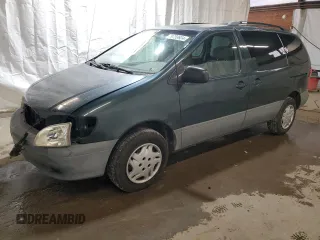 2001 Toyota Sienna LE with VIN 4T3ZF13C21U364516, listed as a Copart auction lot 79759924 with 100,185 mi miles and Salvage Title. Bid and sale history available at carsss.com. Image 1.