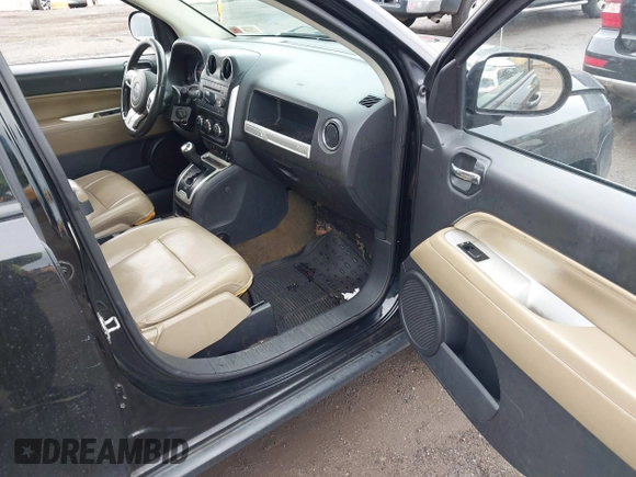 2016 Jeep Compass High Altitude Edition with VIN 1C4NJDEB4GD695249, listed as a IAAI auction lot 42030142 with 155,849 mi miles. Bid and sale history available at carsss.com. Image 5.