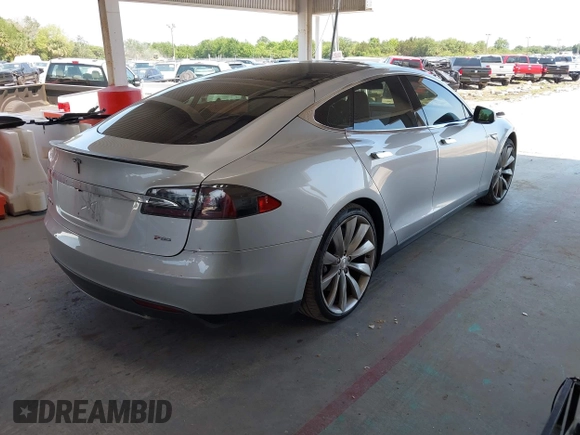 2013 Tesla Model S Performance with VIN 5YJSA1DP6DFP07999, listed as a IAAI auction lot 42284612 with 123,261 mi miles and . Bid and sale history available at DreamBid. Image 4.