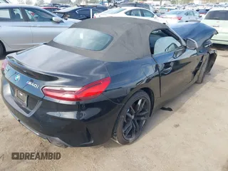 2022 BMW Z4 sDriveM40i with VIN WBAHF9C08NWX88691, listed as a IAAI auction lot 40983519 with 11,108 mi miles. Bid and sale history available at carsss.com. Image 4.