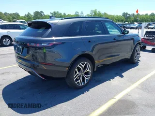 2020 Land Rover Range Rover Velar R-Dynamic S z VIN SALYK2EX5LA243809, wystawiony jako IAAI lot #42200383 z przebiegiem 66 381 mil mil oraz . Historia ofert i sprzedaży dostępna na DreamBid. Obrazek 4.