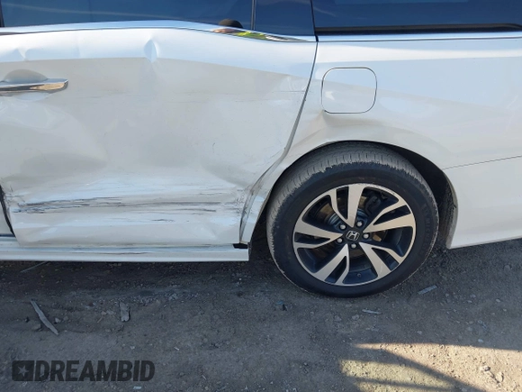 2020 Honda Odyssey Elite with VIN 5FNRL6H92LB014671, listed as a IAAI auction lot 42110389 with 104,180 mi miles and . Bid and sale history available at DreamBid. Image 6.