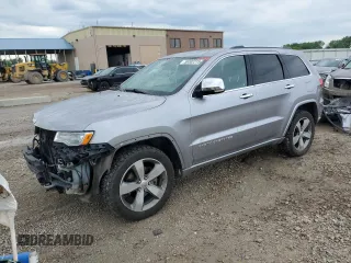 2015 Jeep Grand Cherokee High Altitude with VIN 1C4RJFCG2FC196563, listed as a Copart auction lot 56302315 with 143,759 mi miles and Salvage title. Bid and sale history available at DreamBid. Image 1.