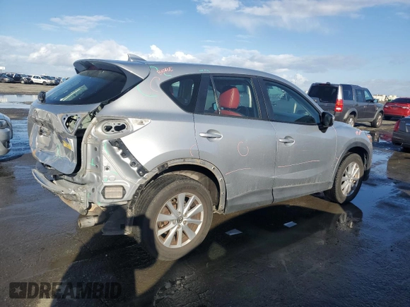 2016 Mazda CX-5 Sport with VIN JM3KE2BEXG0904597, listed as a Copart auction lot 86293834 with 63,343 mi miles and Salvage Title. Bid and sale history available at carsss.com. Image 3.
