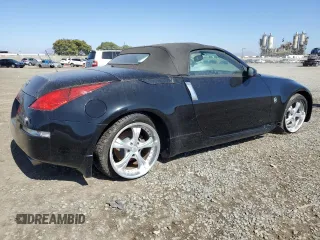 2004 Nissan 350Z Touring with VIN JN1AZ36A74T002301, listed as a Copart auction lot 61720524 with 101,779 mi miles and Salvage Title. Bid and sale history available at carsss.com. Image 3.