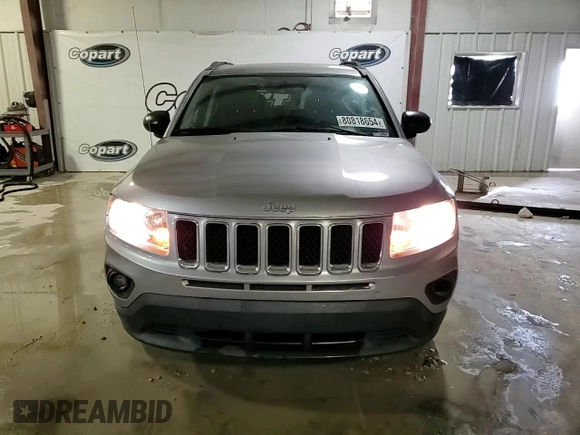 2016 Jeep Compass Sport SE z VIN 1C4NJCBA1GD634172, wystawiony jako Copart lot #80818654 z przebiegiem 185 674 mil mil oraz Szkoda całkowita • Salvage title. Historia ofert i sprzedaży dostępna na DreamBid. Obrazek 14.