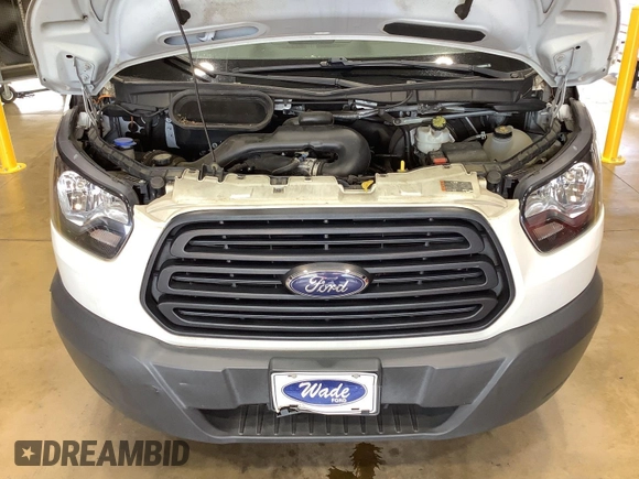 2019 Ford Transit with VIN 1FTYE1YM4KKB86909, listed as a IAAI auction lot 42749952 with 113,691 mi miles and . Bid and sale history available at DreamBid. Image 7.