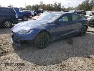2022 Tesla Model S Plaid with VIN 5YJSA1E62NF459659, listed as a Copart auction lot 86511774 with 14,105 mi miles and Salvage Title. Bid and sale history available at DreamBid. Image 1.