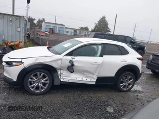 2021 Mazda CX-30 Select with VIN 3MVDMBBL3MM205256, listed as a IAAI auction lot 41302313 with 17,709 mi miles and . Bid and sale history available at DreamBid. Image 15.