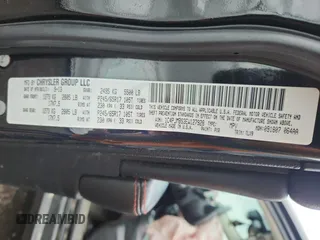 2014 Jeep Cherokee Trailhawk with VIN 1C4PJMBS3EW127928, listed as a Copart auction lot 63825865 with 172,712 mi miles and Salvage title. Bid and sale history available at DreamBid. Image 13.