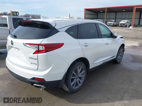 2023 Acura RDX w/Technology Package with VIN 5J8TC2H50PL000526, listed as a IAAI auction lot 41651420 with 33,354 mi miles. Bid and sale history available at carsss.com. Image 4.