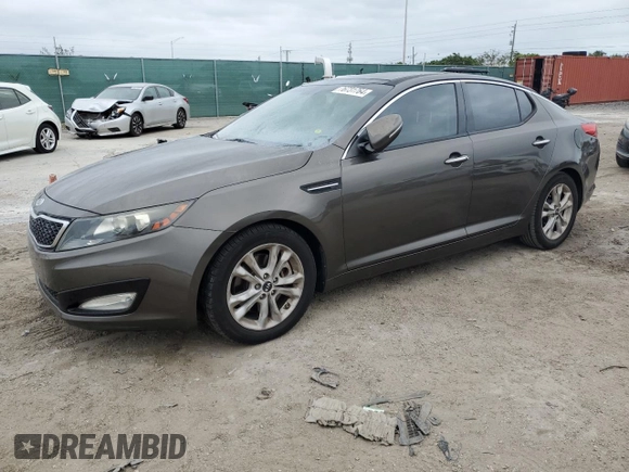 2011 Kia Optima EX with VIN KNAGN4A65B5139487, listed as a Copart auction lot 76731764 with Not Provided miles and Salvage Title. Bid and sale history available at carsss.com. Image 1.
