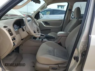 2005 Ford Escape XLT with VIN 1FMYU03165KC03784, listed as a Copart auction lot 64299225 with 185,033 mi miles and Salvage title. Bid and sale history available at DreamBid. Image 7.
