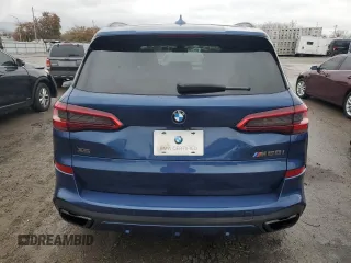 2020 BMW X5 M50i with VIN 5UXJU4C07LLE46002, listed as a Copart auction lot 77853984 with 74,098 mi miles and Salvage Title. Bid and sale history available at DreamBid. Image 6.
