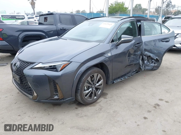 2023 Lexus UX 250h F Sport z VIN JTHB6JBH9P2132431, wystawiony jako IAAI lot #42137625 z przebiegiem 15 923 mil mil oraz . Historia ofert i sprzedaży dostępna na DreamBid. Obrazek 19.