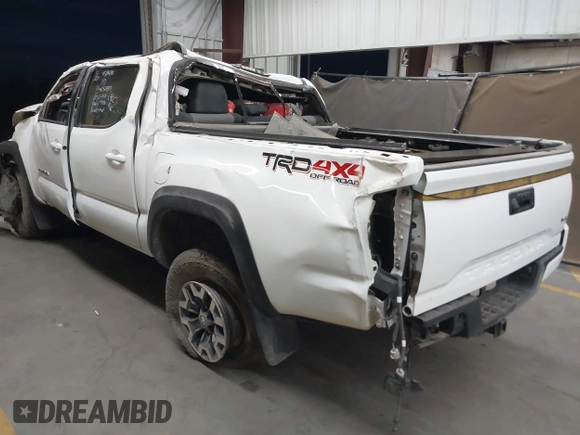 2023 Toyota Tacoma SR with VIN 3TMCZ5ANXPM652495, listed as a IAAI auction lot 42375230 with 26,736 mi miles and . Bid and sale history available at DreamBid. Image 3.