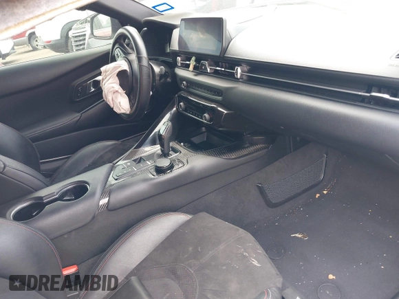 2021 Toyota Supra 2.0 with VIN WZ1DB2C0XMW043249, listed as a IAAI auction lot 42085092 with Not provided miles and . Bid and sale history available at DreamBid. Image 5.