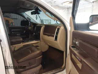 2015 Ram 1500 Laramie Limited with VIN 1C6RR7WM6FS678840, listed as a IAAI auction lot 42040449 with Not provided miles and . Bid and sale history available at DreamBid. Image 5.