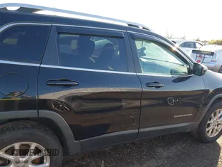 2014 Jeep Cherokee Latitude z VIN 1C4PJMCS2EW124467, wystawiony jako IAAI lot #41944747 z przebiegiem 132 890 mil mil oraz . Historia ofert i sprzedaży dostępna na DreamBid. Obrazek 13.