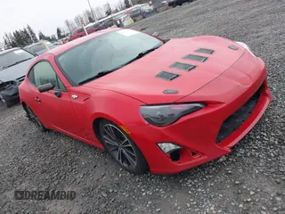2015 Scion FR-S z VIN JF1ZNAA1XF9701225, wystawiony jako IAAI lot #41755832 z przebiegiem 63 573 mil mil oraz . Historia ofert i sprzedaży dostępna na DreamBid. Obrazek 1.