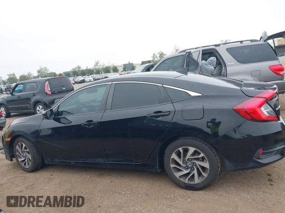 2017 Honda Civic EX z VIN 2HGFC2F74HH522513, wystawiony jako IAAI lot #42277349 z przebiegiem 100 143 mil mil oraz . Historia ofert i sprzedaży dostępna na DreamBid. Obrazek 14.
