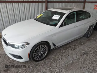 2018 BMW 5 Series 530e with VIN WBAJA9C57JB034128, listed as a IAAI auction lot 41800329 with 66,684 mi miles and . Bid and sale history available at DreamBid. Image 2.