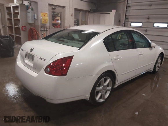 2004 Nissan Maxima SE with VIN 1N4BA41E04C890873, listed as a IAAI auction lot 41468051 with 171,641 mi miles and . Bid and sale history available at DreamBid. Image 4.
