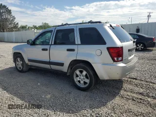 2005 Jeep Grand Cherokee Laredo with VIN 1J4GR48KX5C565762, listed as a Copart auction lot 63080115 with 122,349 mi miles and Salvage title. Bid and sale history available at DreamBid. Image 2.