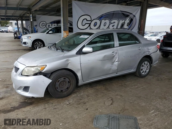 2010 Toyota Corolla with VIN 1NXBU4EE8AZ187793, listed as a Copart auction lot 63909235 with 65,164 mi miles and Salvage title. Bid and sale history available at DreamBid. Image 1.