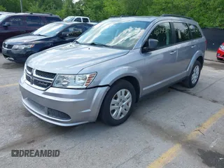 2016 Dodge Journey American Value with VIN 3C4PDCAB0GT134279, listed as a IAAI auction lot 42234584 with 166,437 mi miles and . Bid and sale history available at DreamBid. Image 2.