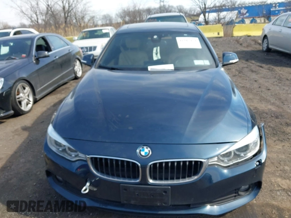 2016 BMW 4 Series 428i xDrive with VIN WBA4C9C56GG141089, listed as a IAAI auction lot 41587479 with 85,462 mi miles and . Bid and sale history available at DreamBid. Image 12.