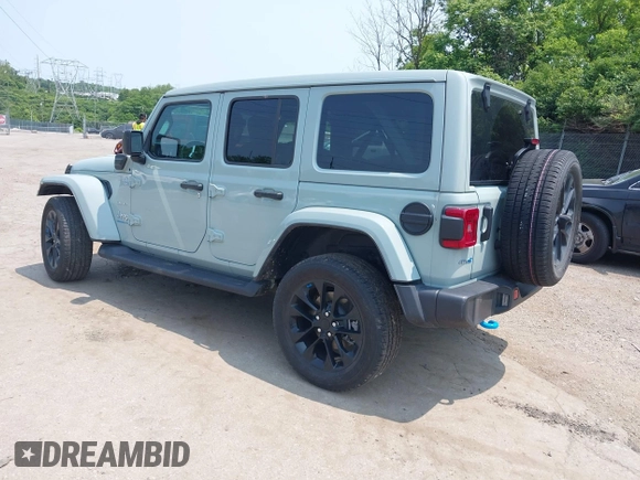 2023 Jeep Wrangler Sahara with VIN 1C4JJXP6XPW554741, listed as a IAAI auction lot 42380681 with 15,148 mi miles and . Bid and sale history available at DreamBid. Image 3.
