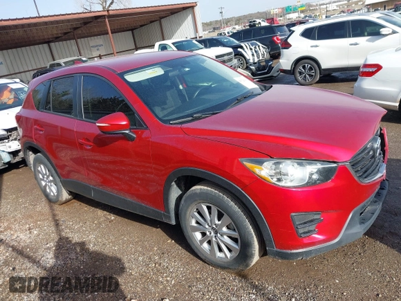2016 Mazda CX-5 Sport with VIN JM3KE2BY3G0754391, listed as a IAAI auction lot 41719461 with 79,130 mi miles. Bid and sale history available at carsss.com. Image 13.