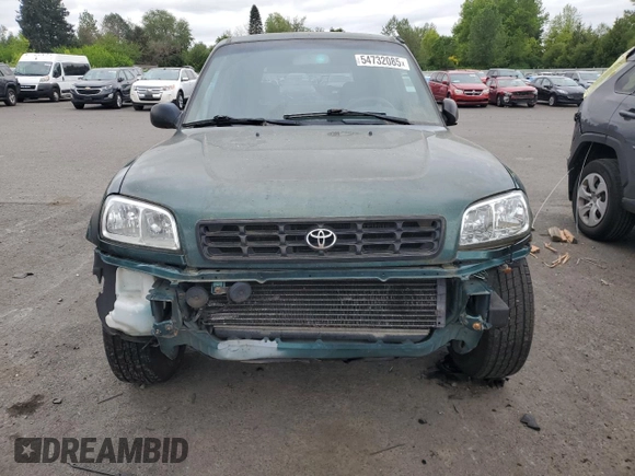 1999 Toyota RAV4 with VIN JT3GP10V2X0037464, listed as a Copart auction lot 54732085 with 306,550 mi miles and Clean Title. Bid and sale history available at DreamBid. Image 5.